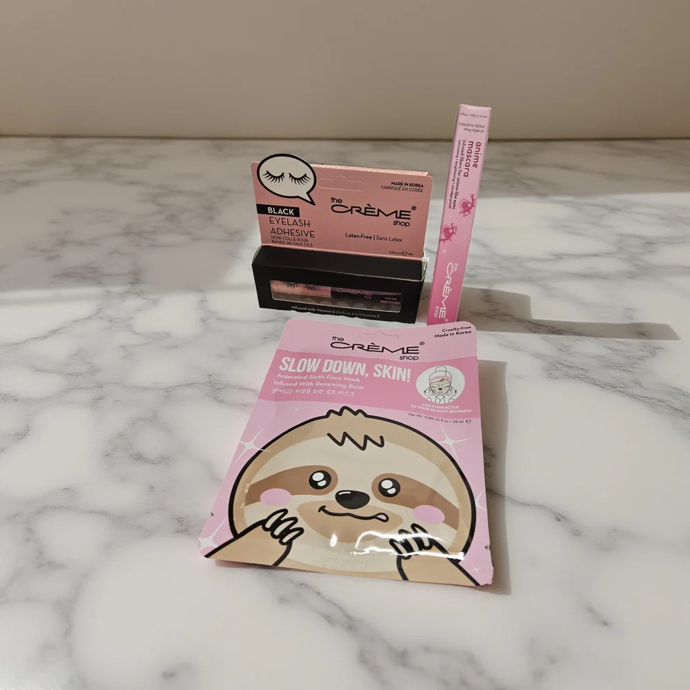 NWOT The Crème Shop Bundle with Eyelash Adhesive, mascara an Sloth Face Mask